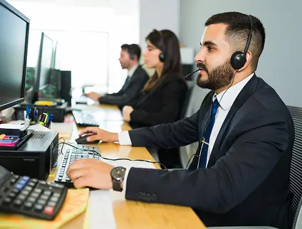 BPO and KPO operations team working at call center stations